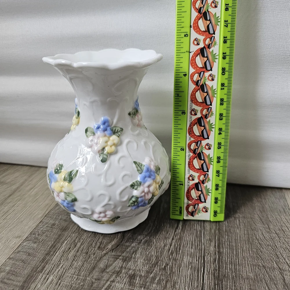 White Ceramic Vase with Pastel Floral Relief